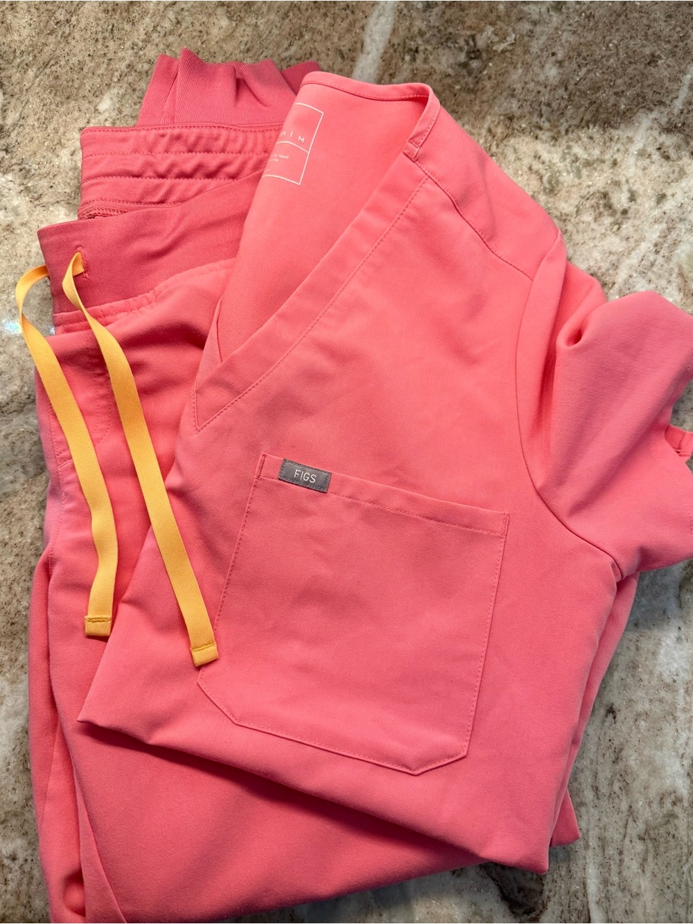 FIGS set in Neon Pink